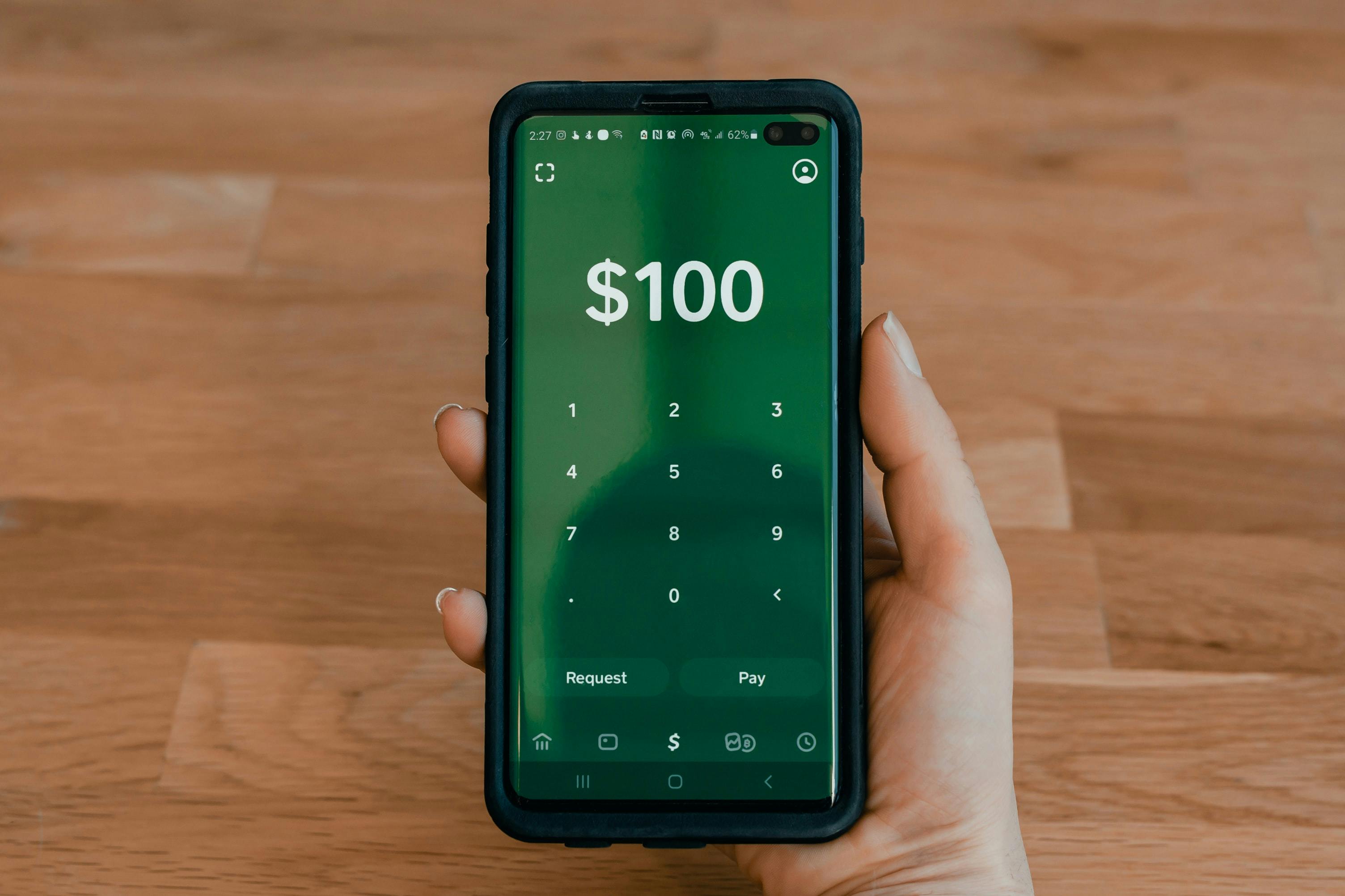 Transferring money via an app on a cellphone